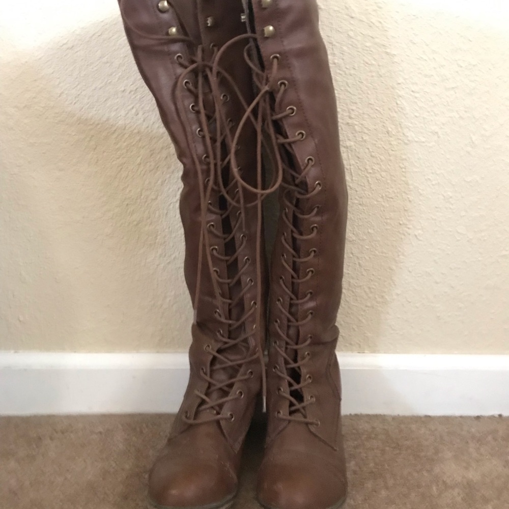 Over the knee lace up boots